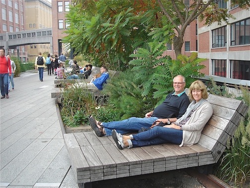 Couple sitting on chairs on the High Line.