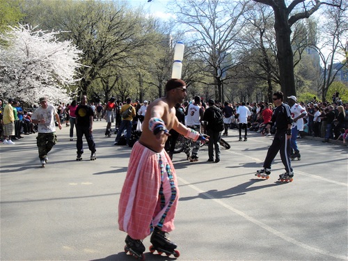 Man on roller skates in Central Park.